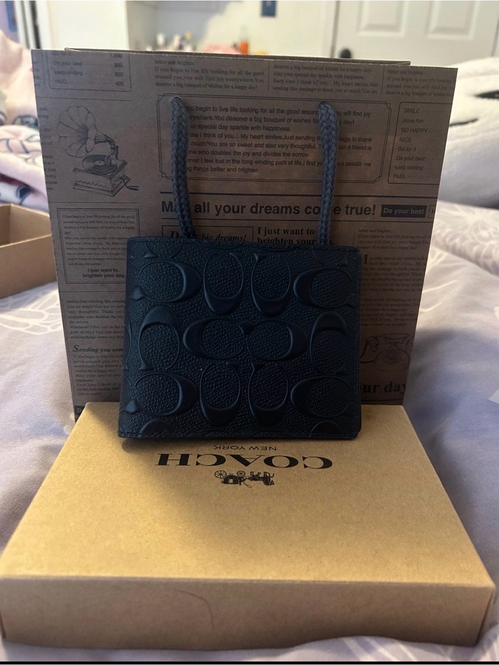 Coach Mini Tote in Black Embossed Signature C
